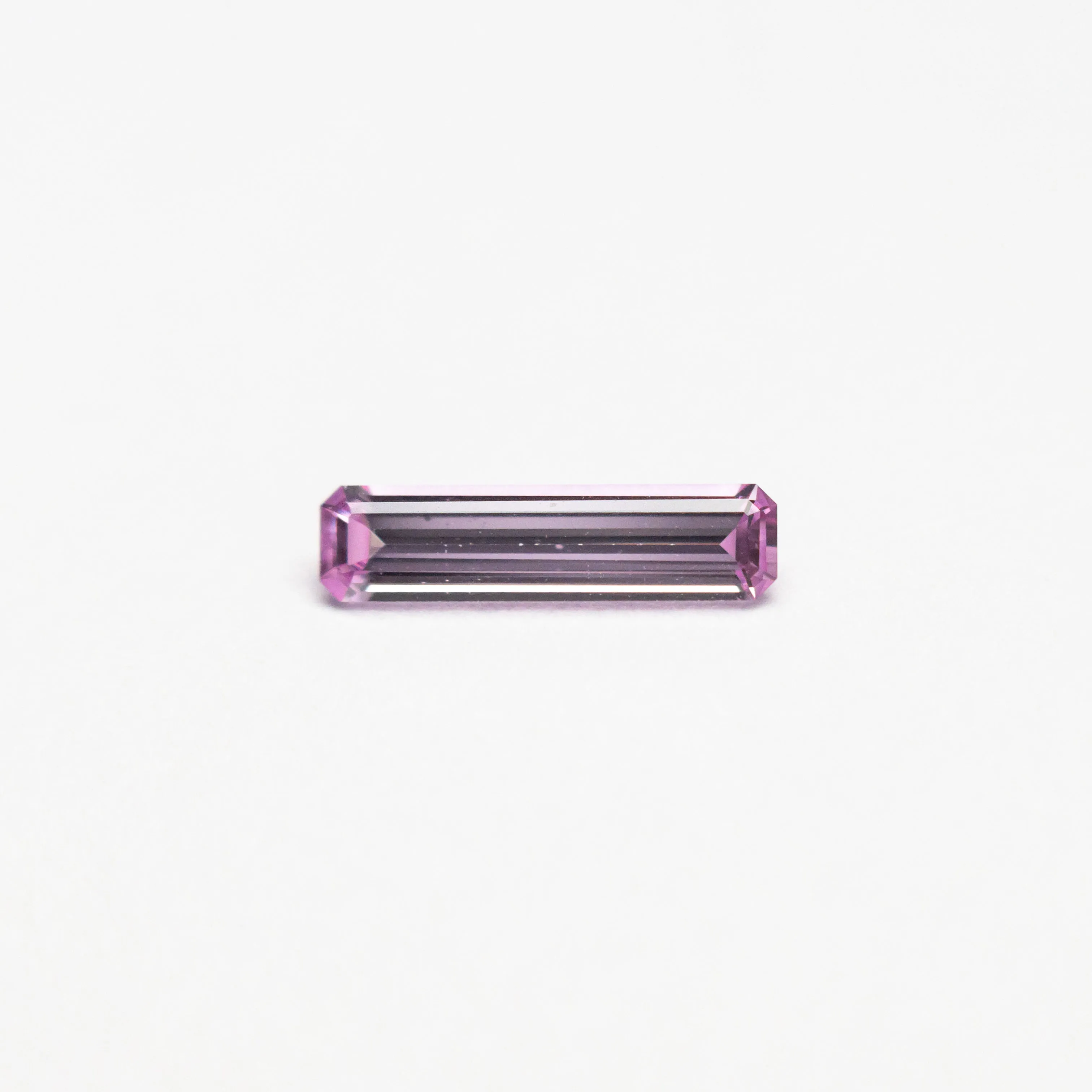 0.26ct 7.92x2.02x1.42mm Cut Corner Rectangle Step Cut Sapphire 23777-02