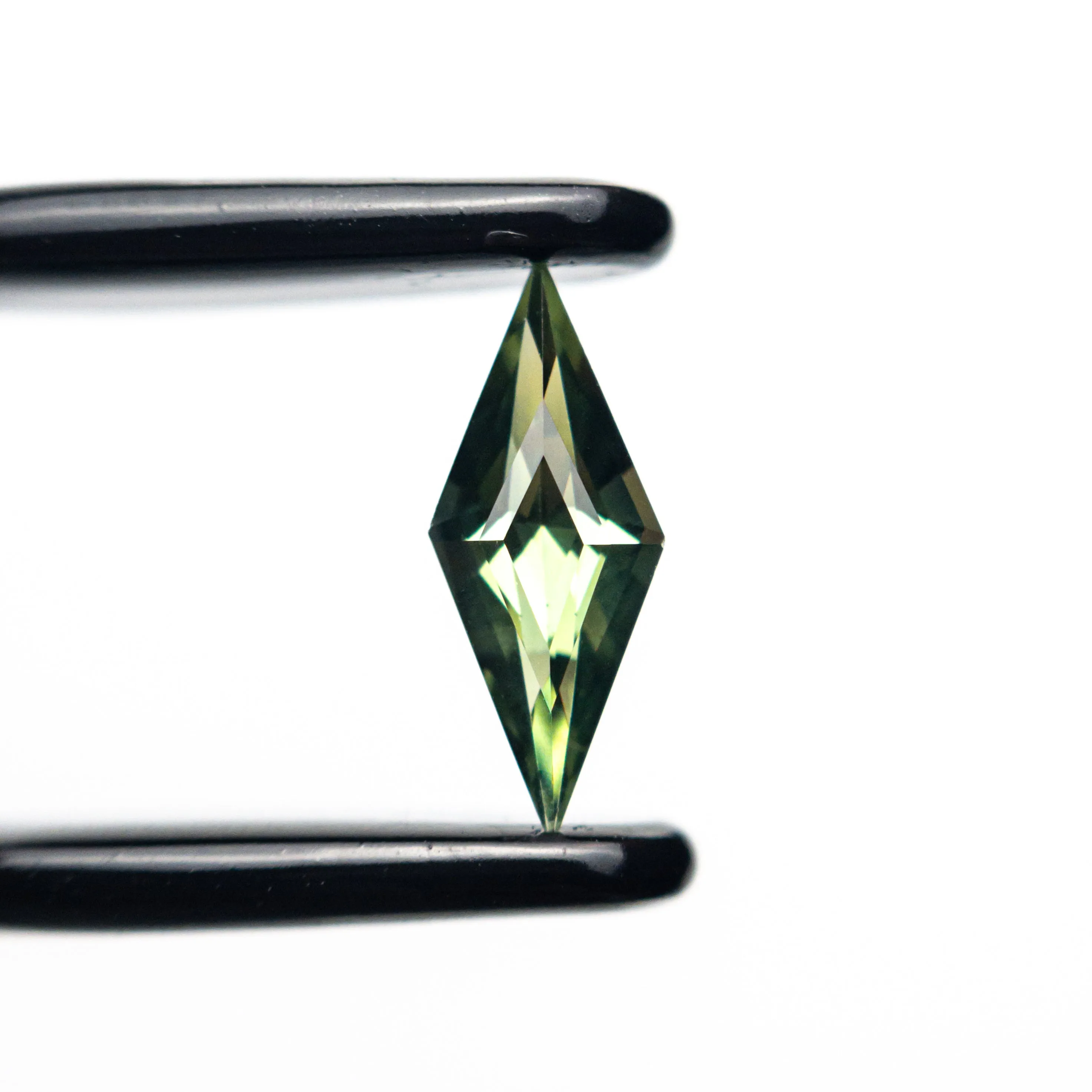 0.46ct 9.84x3.97x2.67mm Lozenge Step Cut Sapphire 25197-08