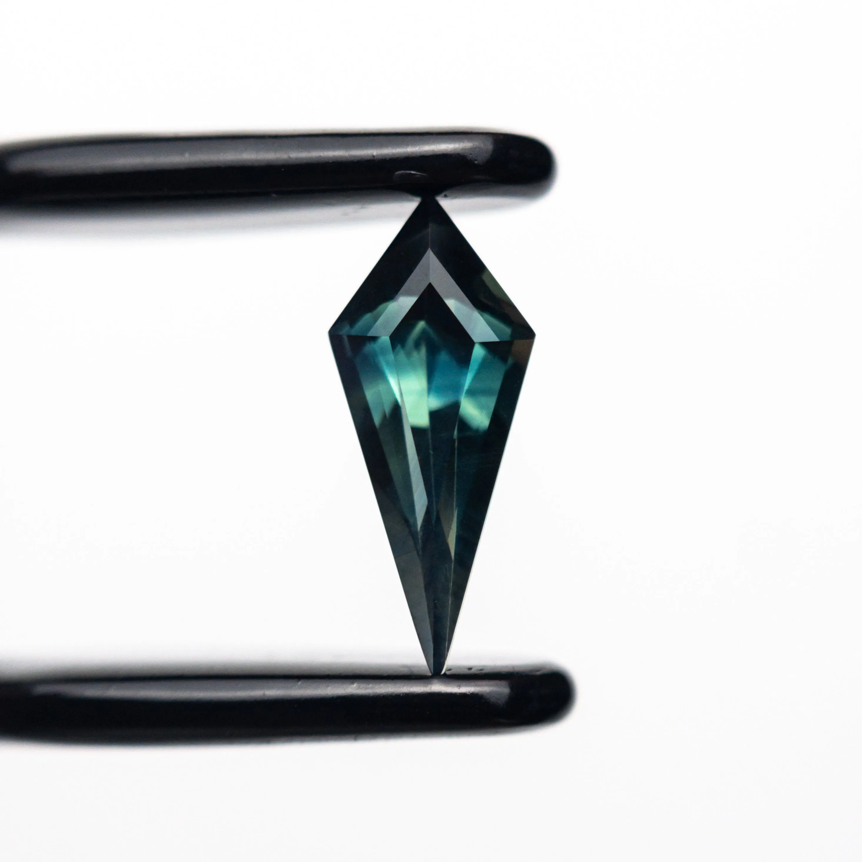 0.63ct 10.32x4.39x2.94mm Kite Step Cut Sapphire 25196-08