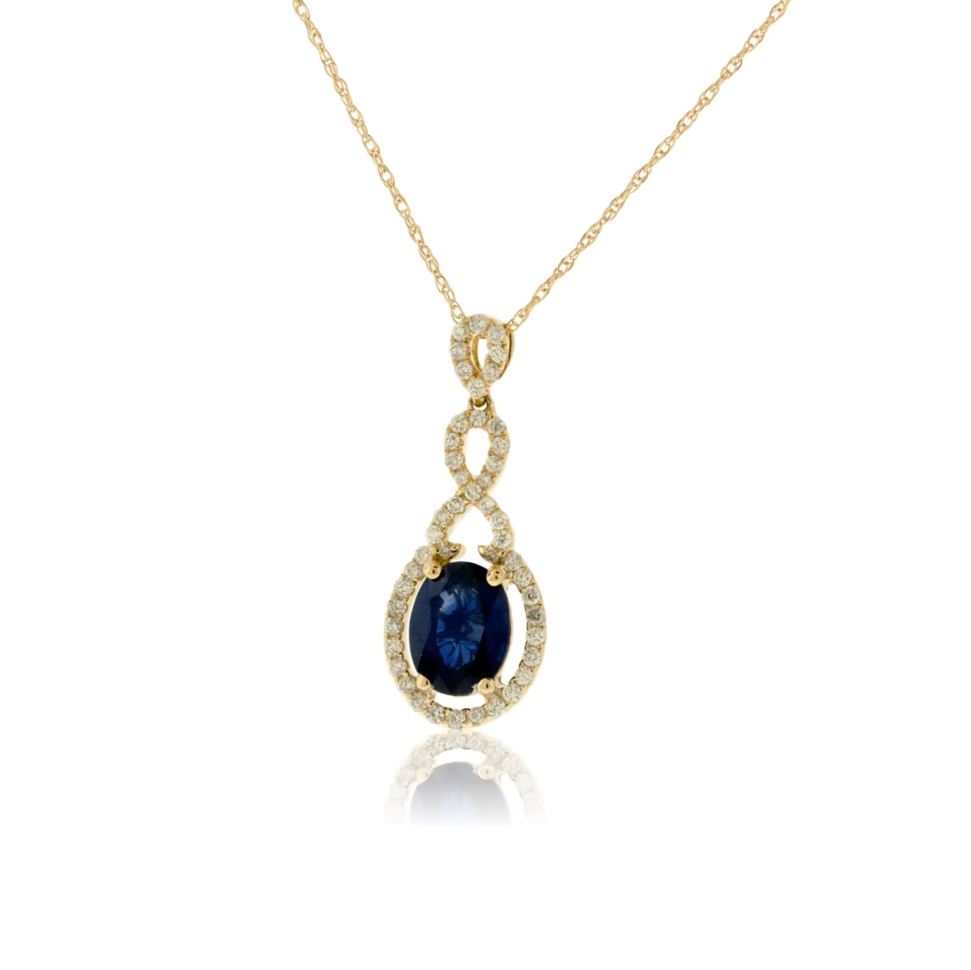Blue Sapphire and Bypassing Style Diamond Pendant