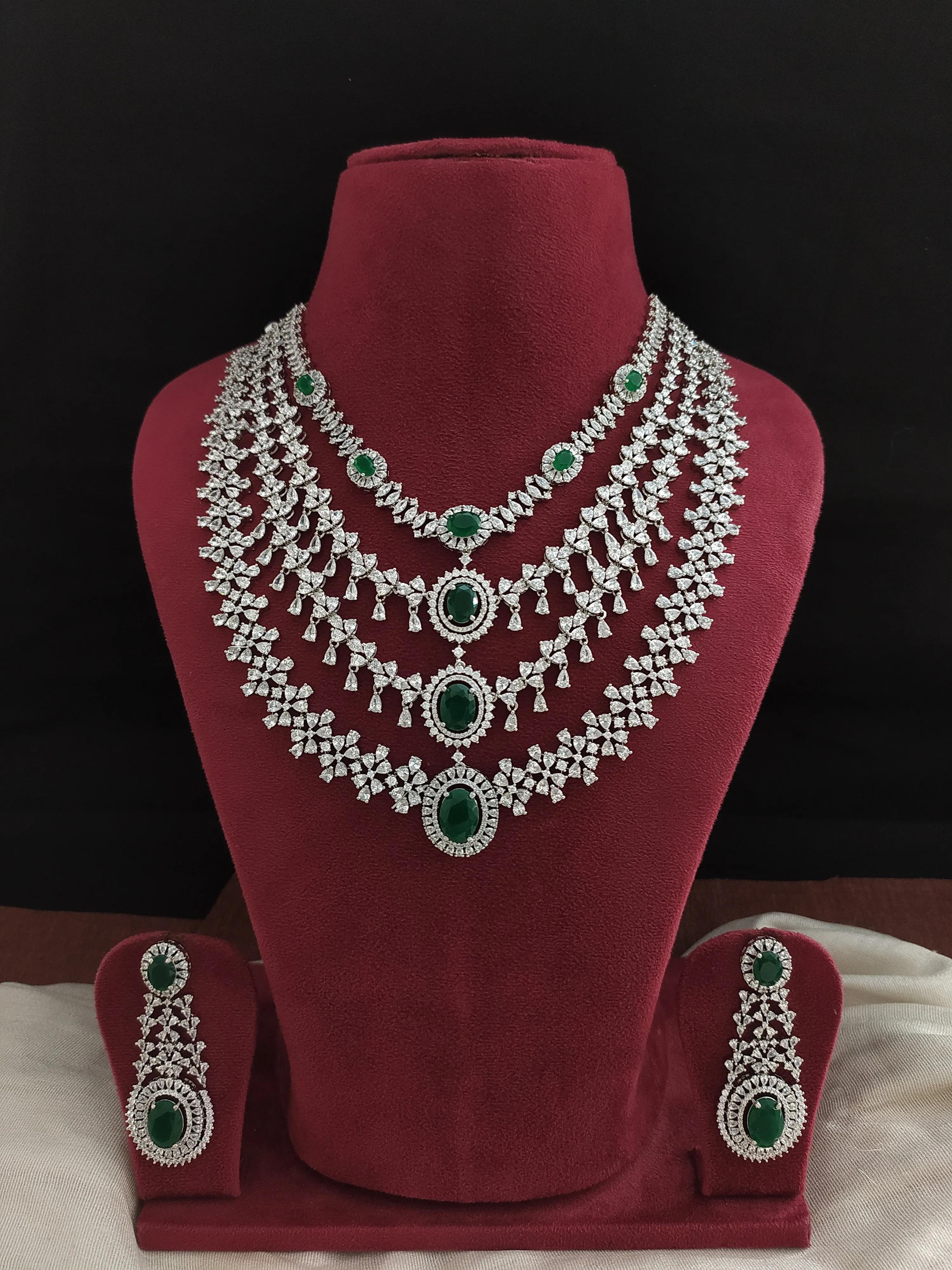 Embrace the captivating beauty of green with Sonal Fashion's Enchanting Emerald Embrace - Green Zircon & Silver Necklace Set!