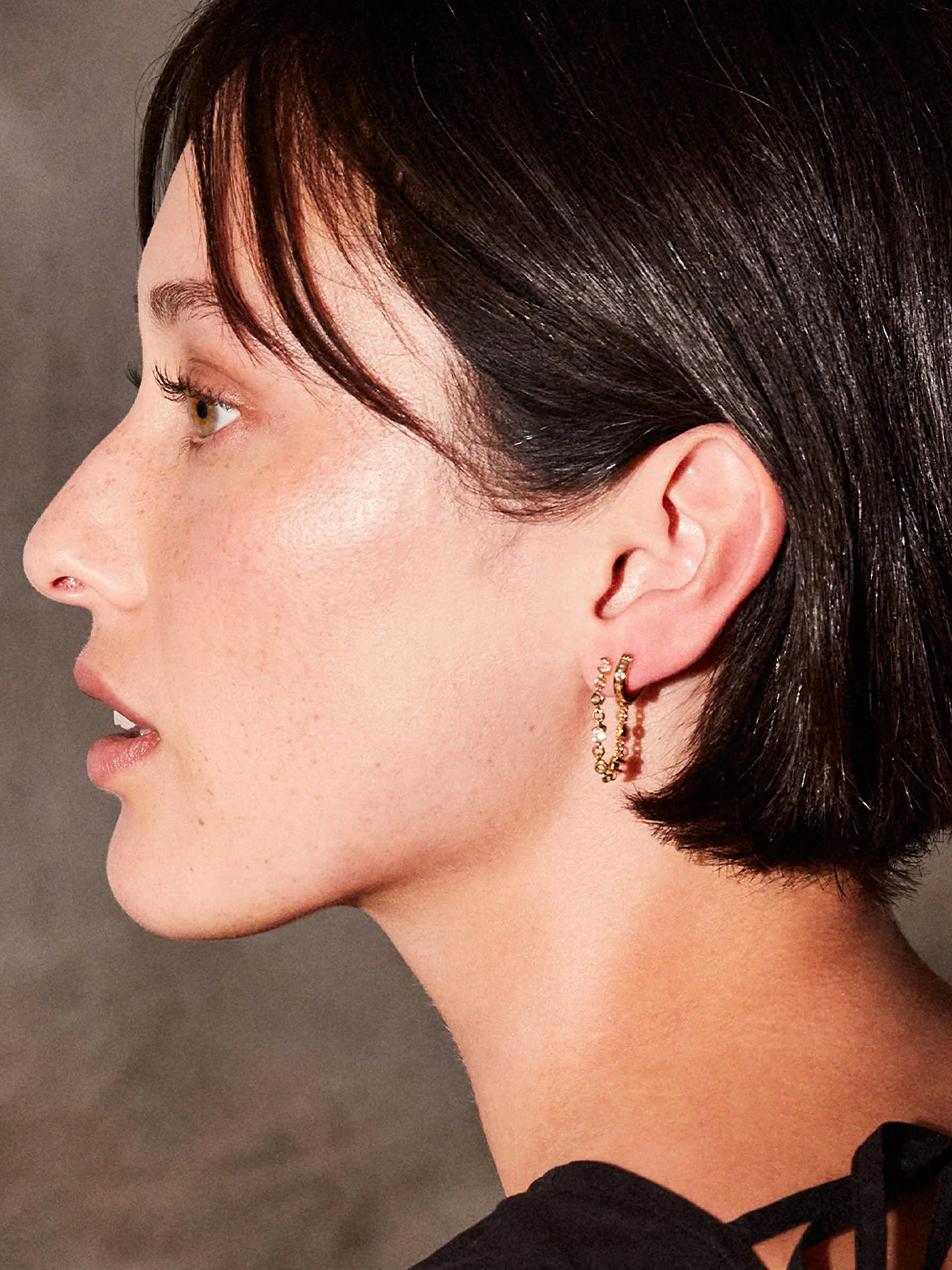 Gold Lyla drop earrings with white topaz