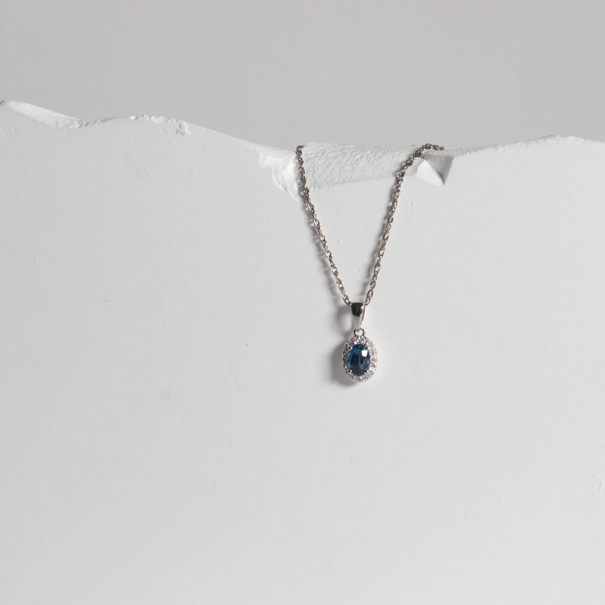 Oval Shaped Yogo Sapphire Halo Necklace