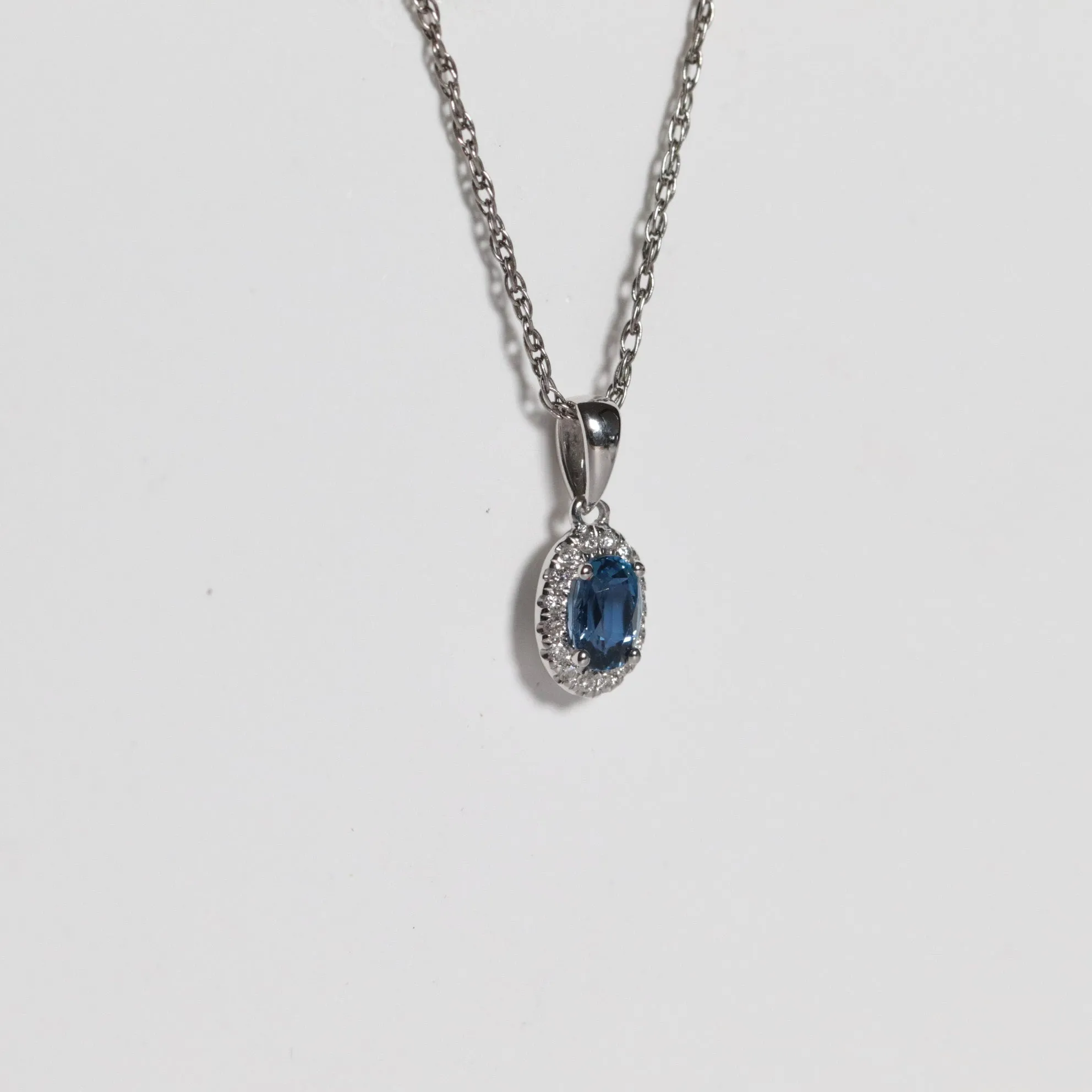 Oval Shaped Yogo Sapphire Halo Necklace