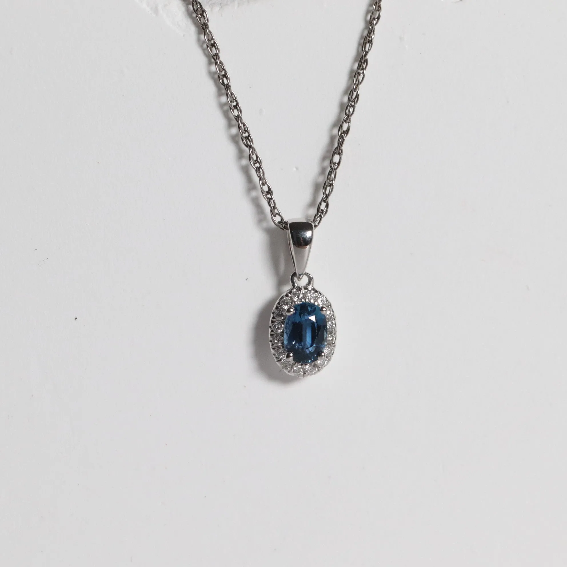 Oval Shaped Yogo Sapphire Halo Necklace