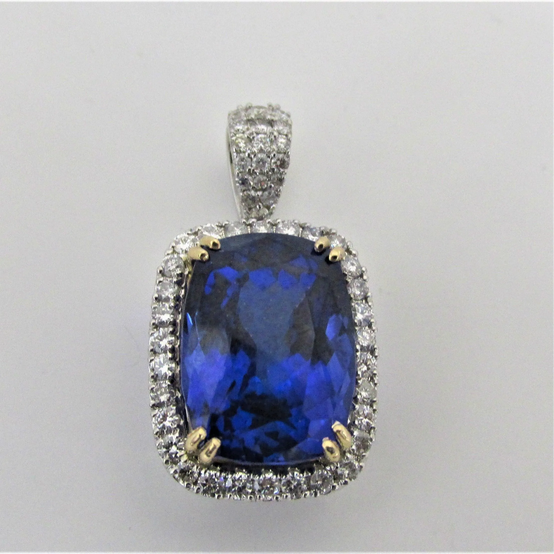 Sapphire Cushion and Diamond Halo Pendant