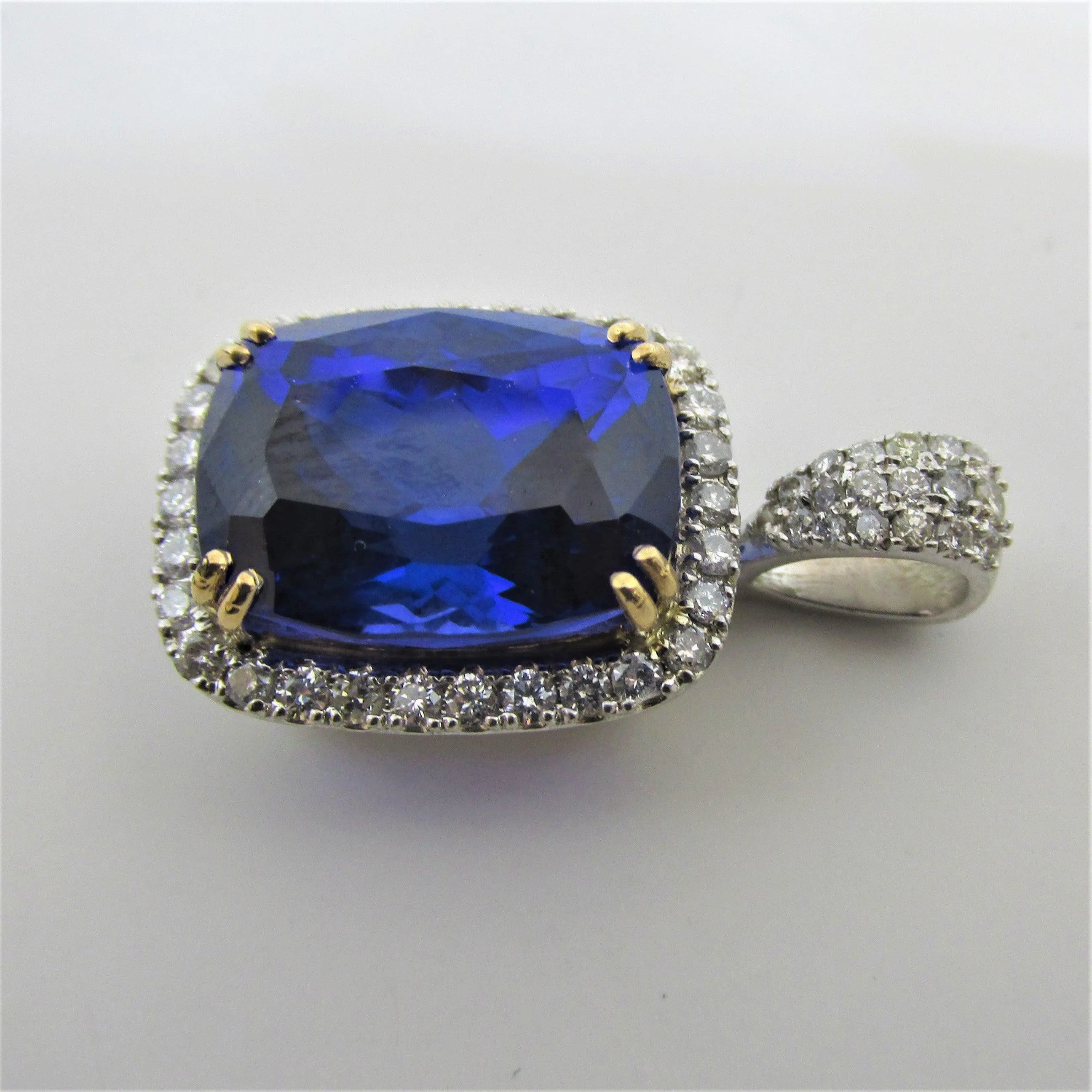 Sapphire Cushion and Diamond Halo Pendant