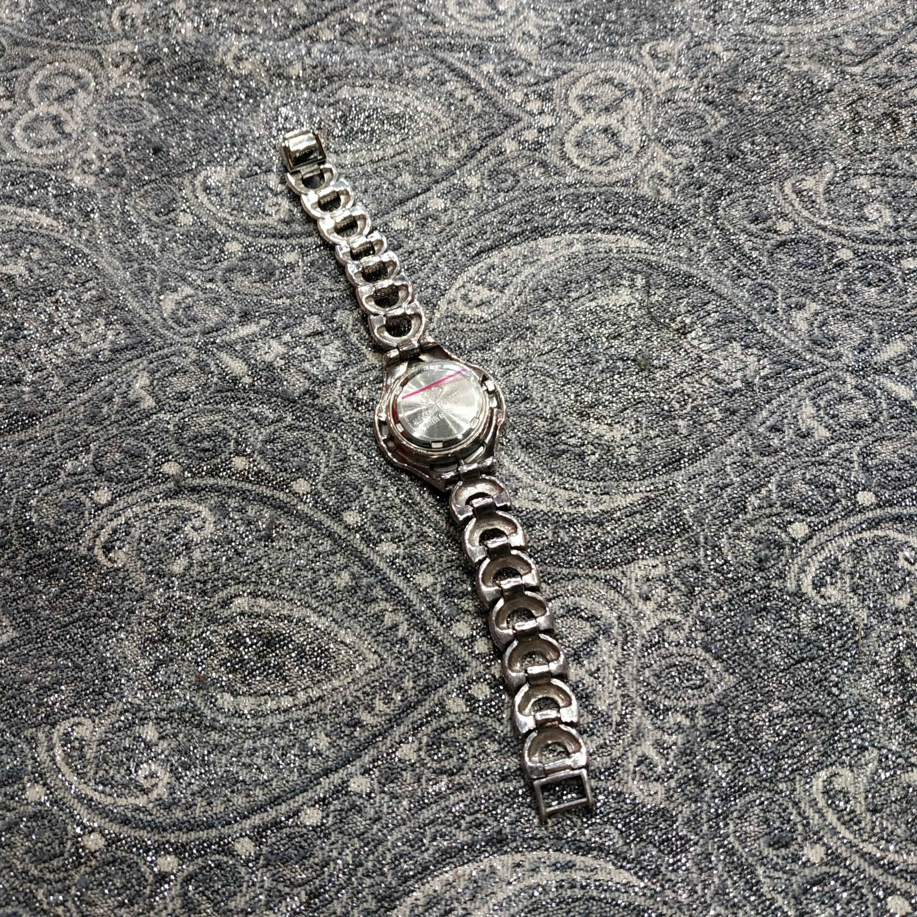 Silver watch with mother of pearl and marcasite