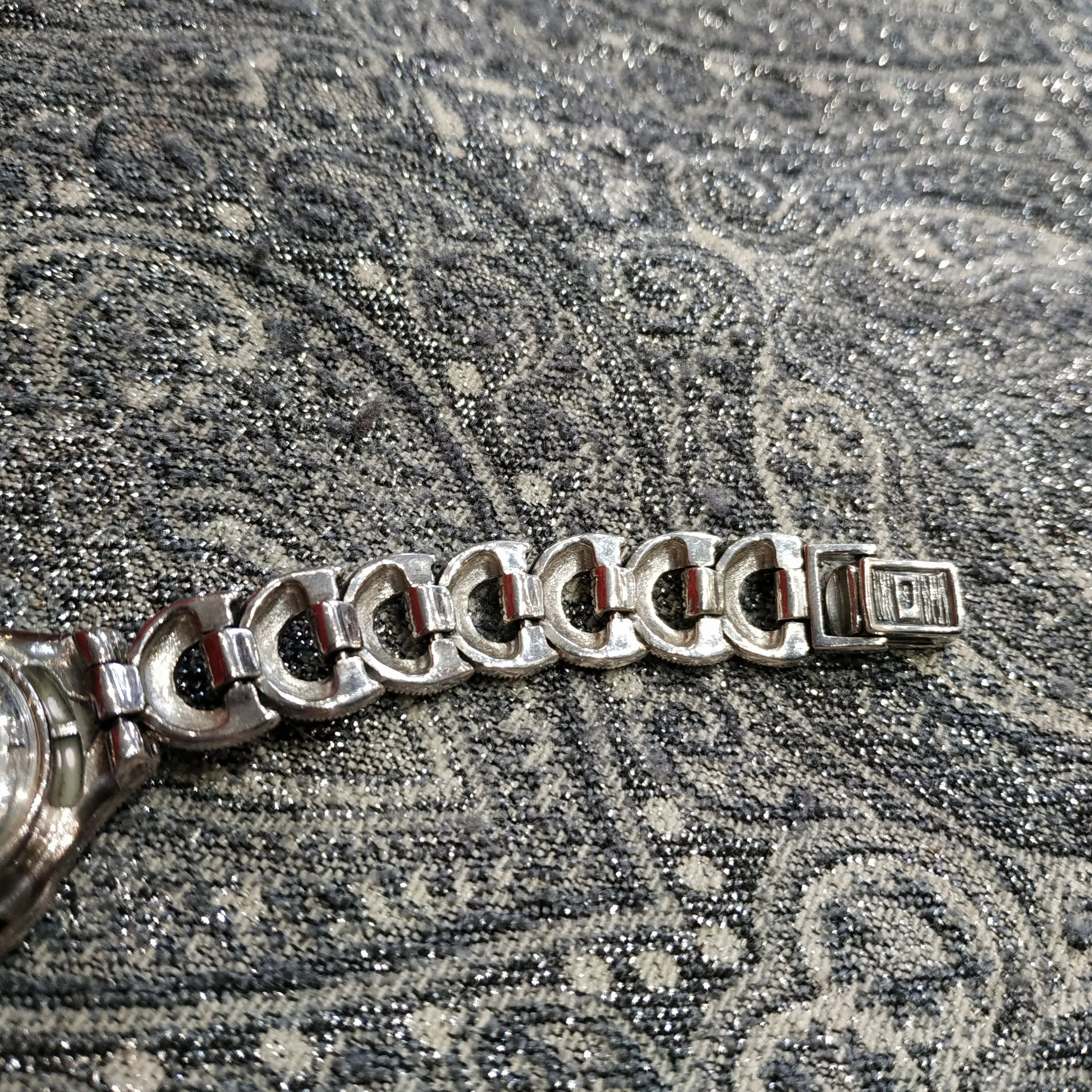 Silver watch with mother of pearl and marcasite