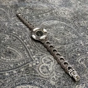 Silver watch with mother of pearl and marcasite